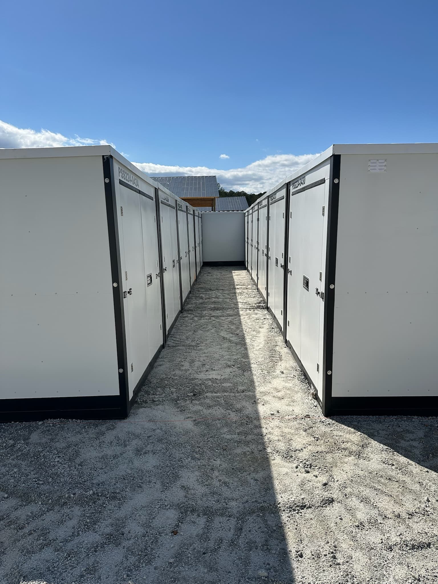 Self-storage buildings with long rows of roll-up doors